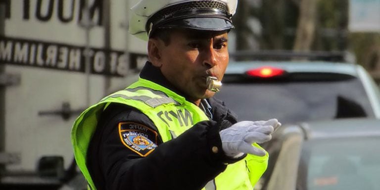 Traffic Officers Manually Directing Traffic